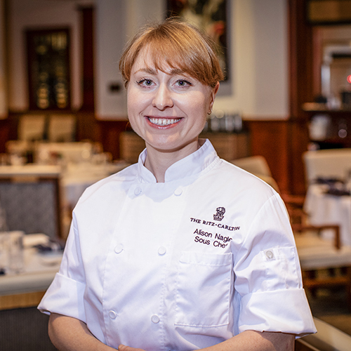 Headshot of the Linger Longer Steakhouse Sous Chef Alison Stern looking at the camera.