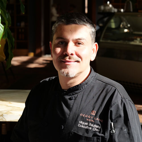 Headshot of Perry Lane Hotel Chef, Miguel Bautista.